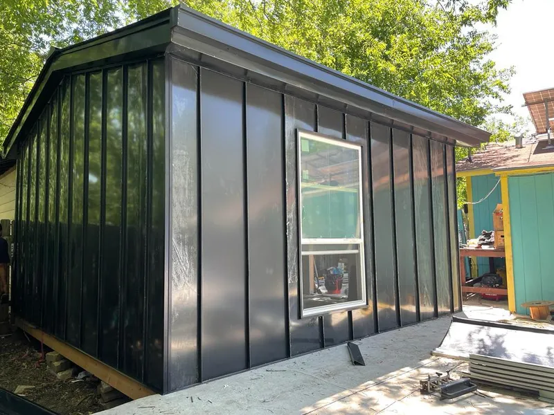 Black standing seam metal wall panels for Roof Inspection in Unionville