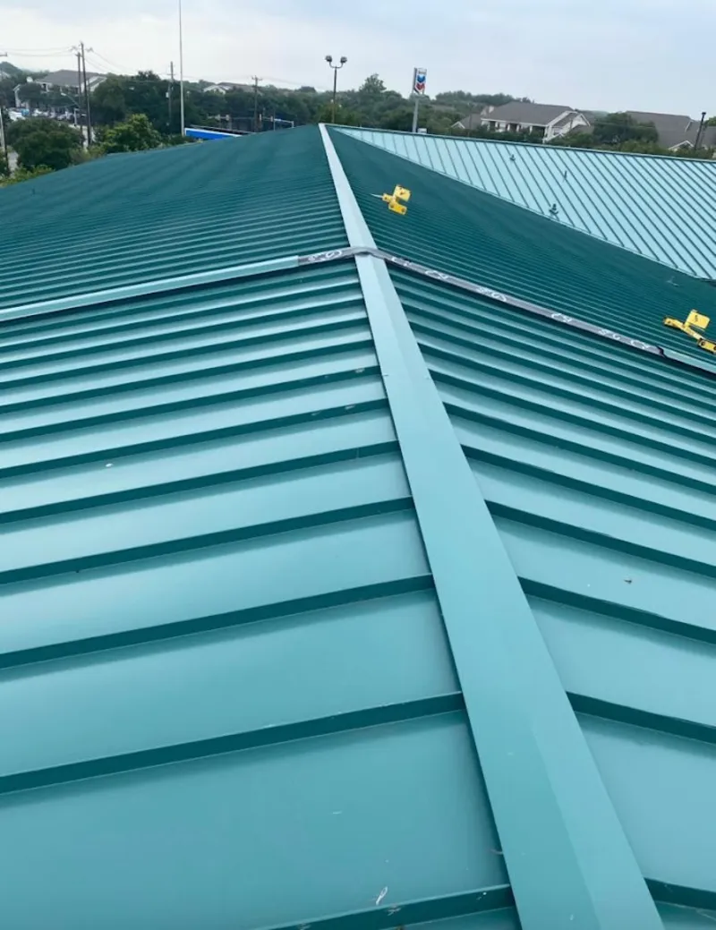 Green commercial metal roof ridge and valley for Metal Roof Repair in Unionville