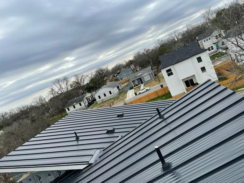 Standing seam metal roof panels with vents for Skylight Repair in Unionville